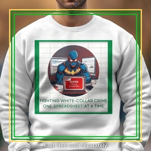 May include: White sweatshirt with a graphic of a superhero working on a laptop with the text "SUPER FRAUD EXAMINER" and the text "FIGHTING WHITE-COLLAR CRIME ONE SPREADSHEET AT A TIME".