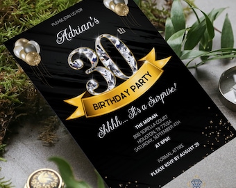 May include: Black and gold birthday party invitation with a diamond-encrusted 30th birthday design. The invitation includes the text "Adrian's 30th Birthday Party Shhh... It's a Surprise!" and details for the event, including the date, time, location, and RSVP information.