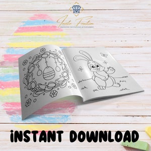 May include: A black and white coloring book with two pages showing an Easter bunny and a wreath with eggs. The book is open and the pages are blank, ready to be colored. The text "Invite Fruition" is visible on the top of the book.