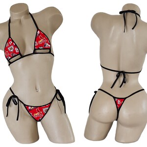 May include: A red and black bikini with a St. Louis Cardinals print. The bikini top is a triangle style with adjustable straps. The bikini bottom is a cheeky style with adjustable ties on the sides.