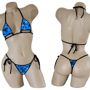May include: A blue and black patterned bikini with a triangle top and a string bottom.