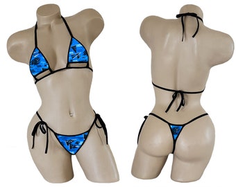 May include: A blue and black patterned bikini with a triangle top and a string bottom.