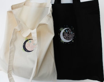 Crystal Crescent Moon and Stars Flower Embroidered Cotton Canvas Shoulder Tote in Black and Natural / White