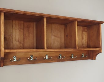 s6 Handcrafted wall mounted compartments unit with hooks
