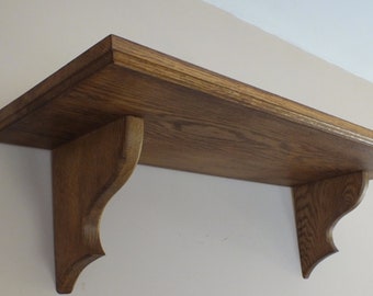 s80 Oak wall mounted shelf with beautifully crafted brackets