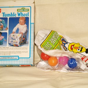 Vintage Hasbro Bradley U.K. 1986 Playskool baby Tumble Wheel ABC Sesame street