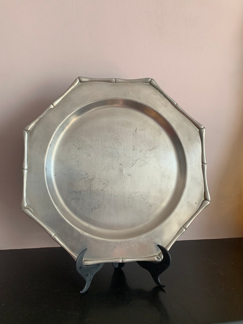 A Set of 8 Octagonal Dishes, Elegant Trivet in Stylish White Iron, the