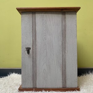 Antique medicine cabinet with a small Art Nouveau lock, antique wall-mounted cabinet, bathroom cabinet