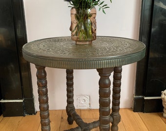 Antique 1920 pedestal table with oriental decorated brass top