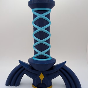 May include: A dark blue fantasy sword with a light blue wrapped handle and a gold diamond accent. The sword has a stylized design with curved wings on the hilt and a pointed top.