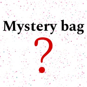 May include: A white background with a red question mark and the text "Mystery bag" in black.