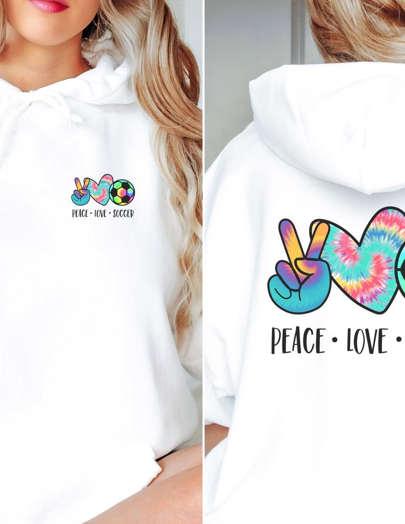 May include: White hoodie with a peace sign, tie-dye heart, and soccer ball graphic. The text "Peace - Love - Soccer" is printed below the graphic.