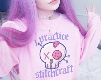 Sweat tête de mort gothique pastel