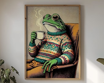 May include: A green frog wearing a colorful sweater sits in a brown armchair and holds a steaming mug of coffee. The frog has a relaxed expression and appears to be enjoying its drink.