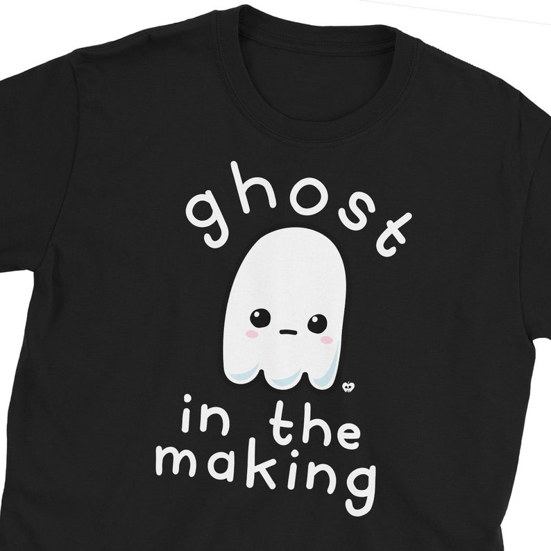 May include: Black t-shirt with a white ghost illustration and the text "ghost in the making".