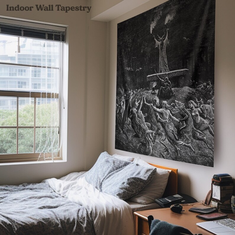 May include: Black and white tapestry featuring a detailed illustration of a scene from a gothic horror story. The image depicts a group of figures with horns and wings, running towards a figure with a raised hand and a torch.