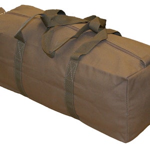 May include: A large, brown canvas duffel bag with two long straps. The bag has a zipper closure and a rectangular shape.