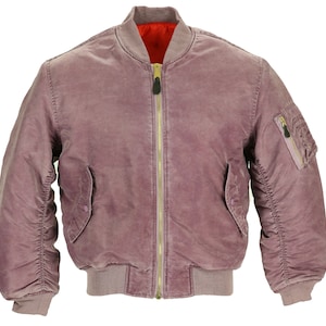 May include: A mauve bomber jacket with a gold zip and a small pocket on the left sleeve.