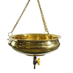 May include: A polished brass bowl suspended by three gold-toned metal chains from a dark wooden arm. The bowl features a rounded rim and a central metal spigot at the bottom with a small yellow handle, designed for controlled liquid dispensing.
