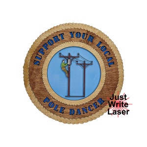 May include: A round wooden sign with a rope border. The sign says "Support Your Local Pole Dancer" in blue text. The center of the sign features a cartoon image of a person climbing a utility pole. The text "Just Write Laser" is in red text in the lower right corner.