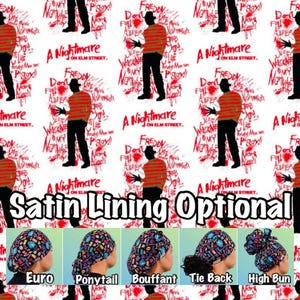 May include: A white fabric featuring a repeating pattern of Freddy Krueger silhouettes in red and black striped sweaters, accompanied by red text reading A Nightmare on Elm Street and various phrases like Don't Fall Asleep.