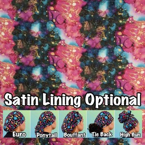 May include: A colorful galaxy print fabric with gold accents. The fabric is available in five different styles: Euro, Ponytail, Bouffant, Tie Back, and High Bun. Satin lining is optional.