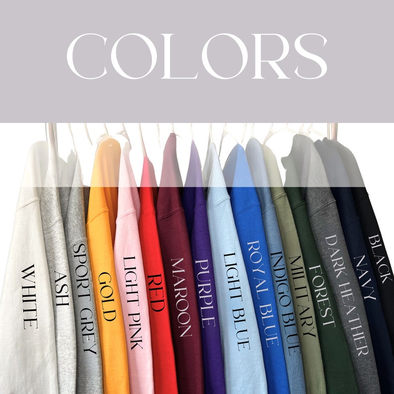 May include: A row of sweatshirts in various colors, including white, ash grey, gold, light pink, red, maroon, purple, light blue, royal blue, indigo blue, military green, forest green, dark heather, navy, and black.
