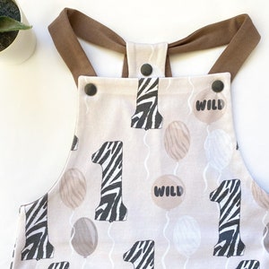 Wild One Slouchy Dungarees | 1st Birthday Romper, Wild One outfit, cake smash, First birthday gift, Safari baby, Jungle, Zebra, photoshoot