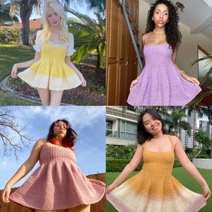 May include: Four women wearing different crochet dresses. The dresses are in various colors, including yellow, purple, pink, and orange. The dresses are all sleeveless and have a simple, flowy design.
