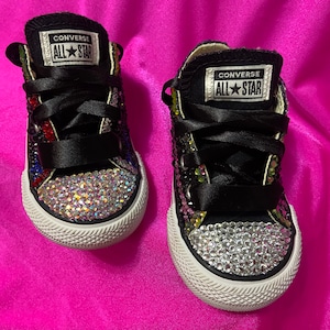 Rhinestone converse, bling converse, customized converse, toddler shoes. Prices start at sixty dollars. Prices increase with size.