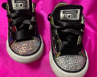 Rhinestone converse, bling converse, customized converse, toddler shoes. Prices start at sixty dollars. Prices increase with size.
