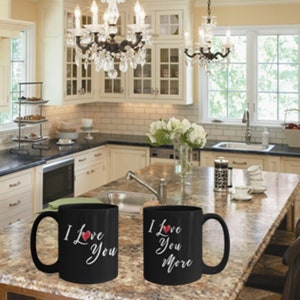 I Love You and I Love You More - Black Coffee Cups - Cute Set of 2 (15 oz Each) Mugs for Engagement Couples and for Bride and Groom