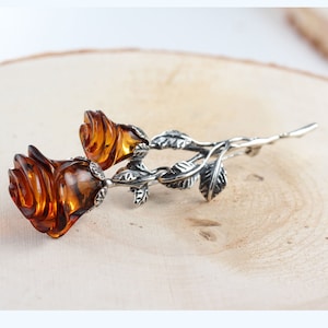 Amber Cognac Rosebud on .925 Stem w/Leaves Pendant Amber Cognac Rosebud on .925 Stem w/Leaves Pendant