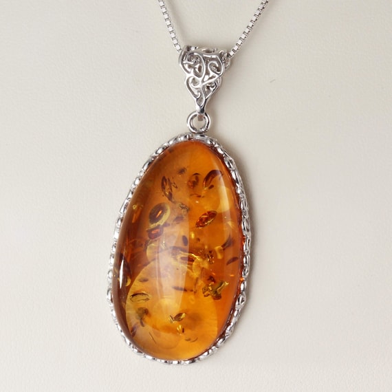 Baltic Amber Necklace Rhodium on Sterling Silver Baltic Amber Necklace Rhodium on Sterling Silver