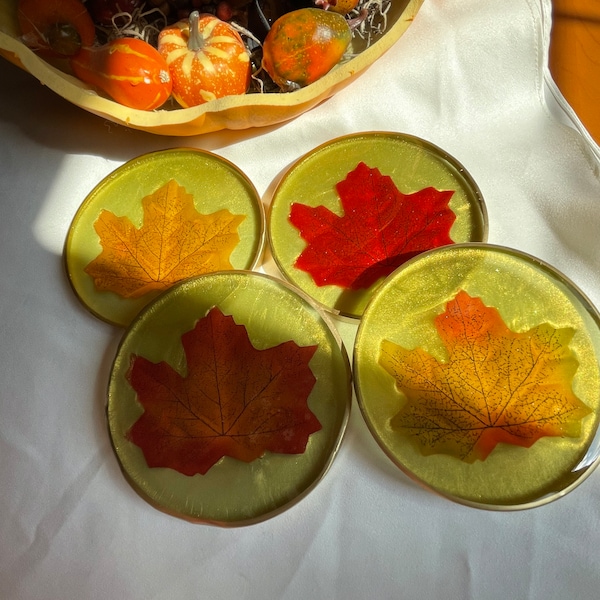 Autumn Resin Coasters (4) with Colorful Leaves Against a Moss Green Background Edged in Gold Leafing