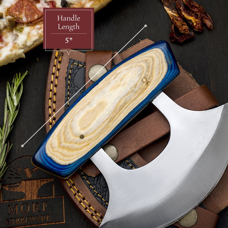 May include: A blue and wood handled knife with a curved blade. The knife is in a leather sheath with the text "Handle Length 5" printed on a red rectangle.