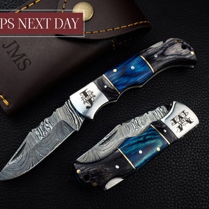 Damascus Pocket Knife - Folding Knife with Steel Bolsters, Monogram Engraving - Blue/Gray wooden handle.
Groomsmen Gift - Custom Personalized Knife Authentic Damascus Steel Wavy Pattern Unique each knife