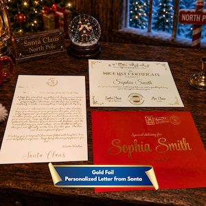 May include: A personalized letter from Santa Claus with gold foil text, a Nice List certificate, and a red envelope addressed to Sophia Smith. The letter features a gold seal, and the certificate includes official signatures from Santa and Mrs. Claus.