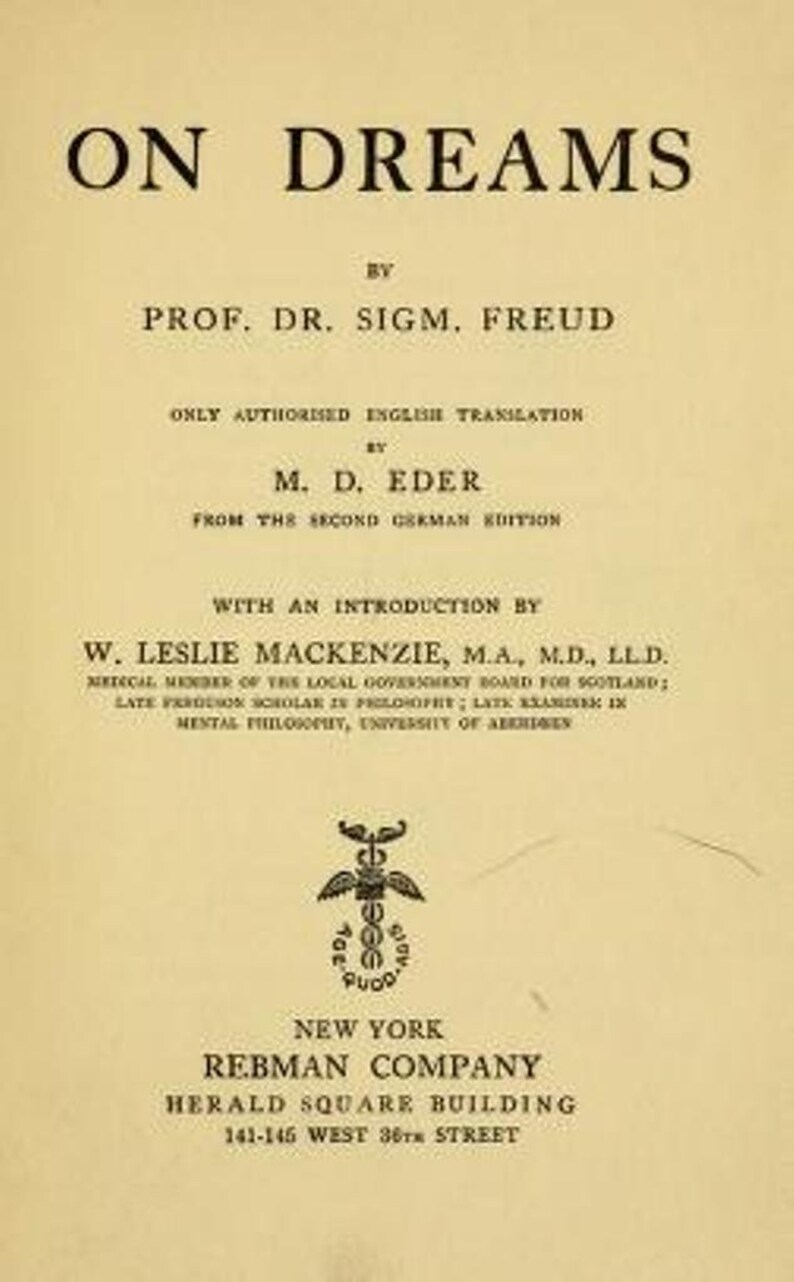 May include: A book cover with the title "On Dreams" by Prof. Dr. Sigm. Freud. The cover is yellow with black text and a small black and white illustration of a winged serpent.