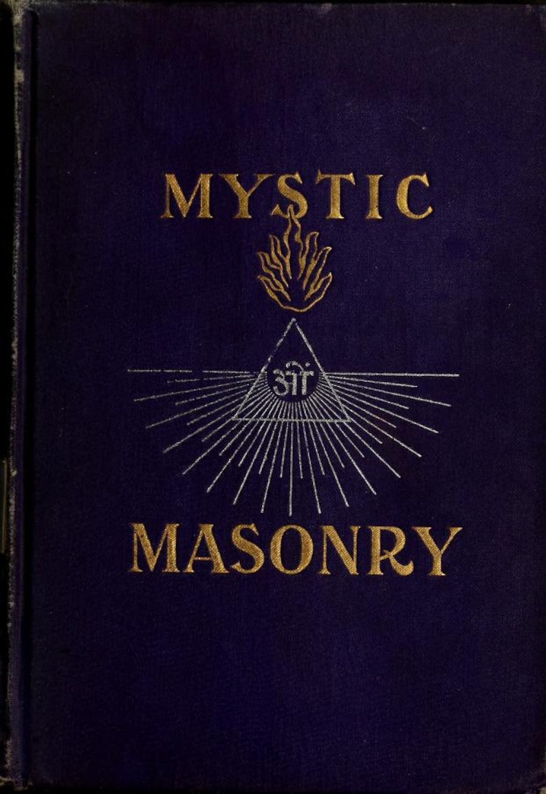May include: A dark blue book cover with the title "MYSTIC MASONRY" in gold lettering. A stylized flame and a triangle with a symbol inside are above the title.