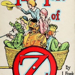 May include: A vintage book cover illustration for "Tik-Tok of Oz" by L. Frank Baum. The cover features a group of characters, including a robot, a girl with a crown, and a man with a long beard, all riding in a basket pulled by a large red "Z".