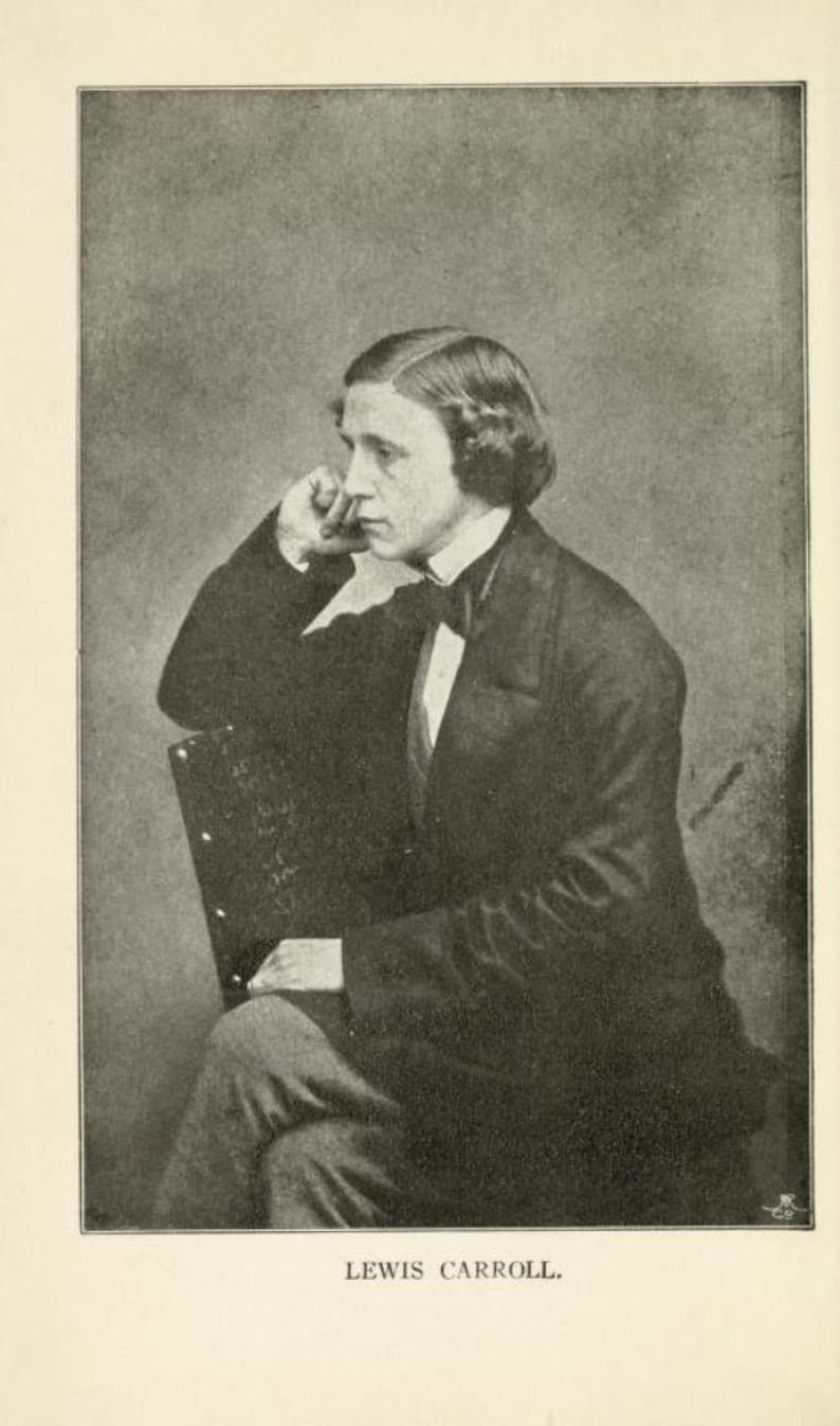 May include: A black and white portrait of Lewis Carroll, a man with a mustache and a bow tie, sitting in a chair with his hand on his chin.