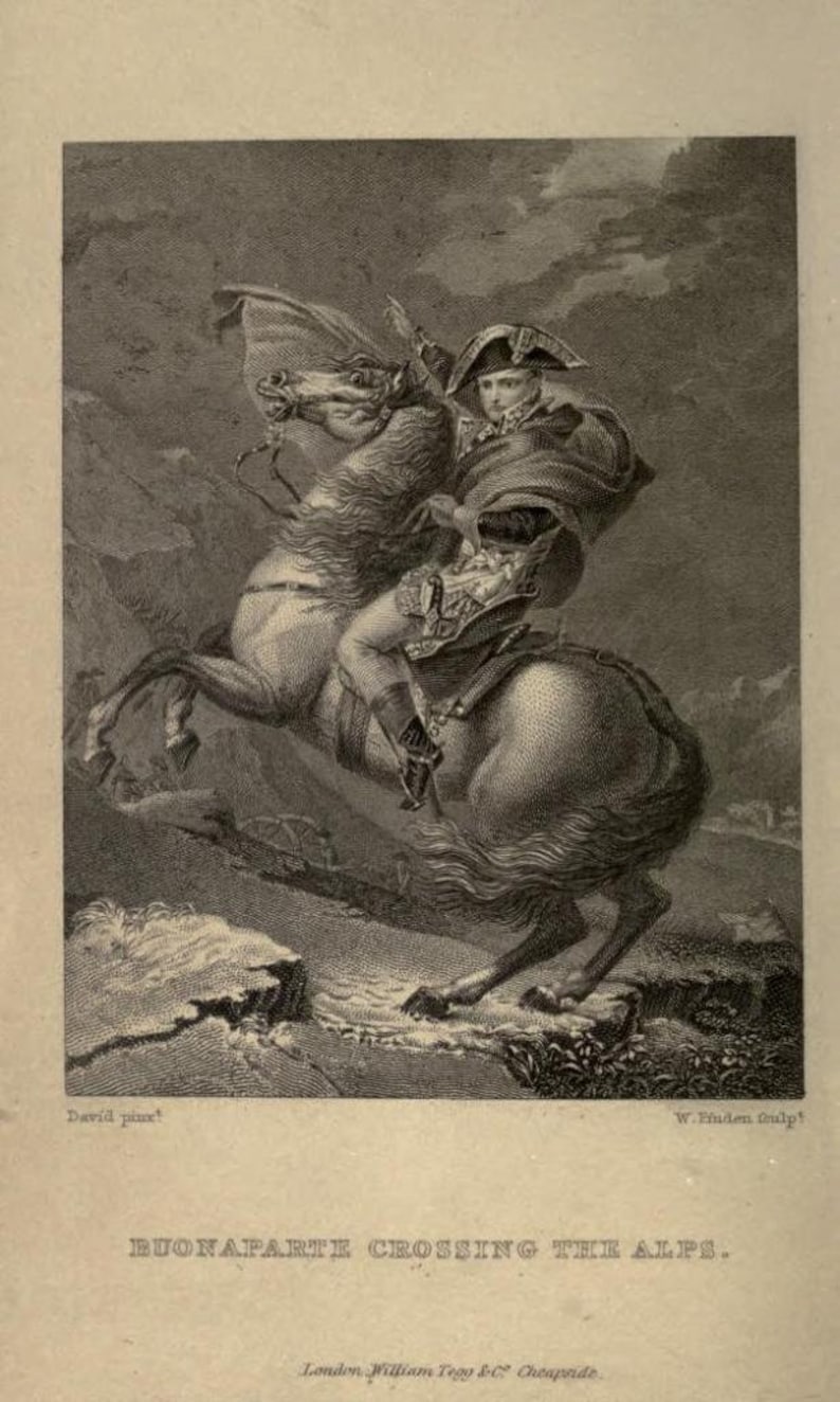 May include: A black and white engraving of Napoleon Bonaparte crossing the Alps on horseback. The image shows Napoleon in military uniform, riding a horse with a determined expression on his face. The engraving is titled "Buonaparte Crossing the Alps."