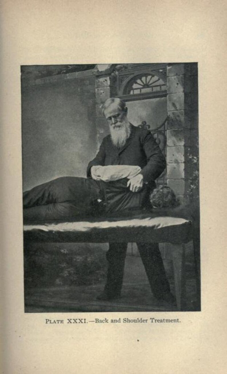 May include: A black and white photo of a man performing a back and shoulder treatment on a patient lying on a table. The photo is labeled "PLATE XXXI. - Back and Shoulder Treatment."