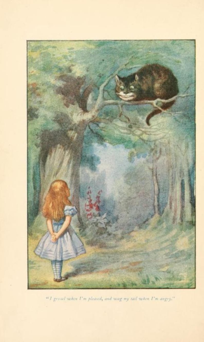 May include: A young girl in a blue and white dress stands in a forest, looking up at a Cheshire Cat sitting in a tree. The cat has a wide grin and is looking down at the girl. The text "I groad when I'm pleased, and wag my tail when I'm angry." is written below the image.