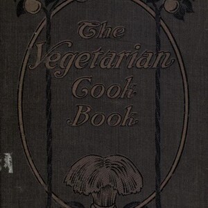 May include: The cover of a vintage cookbook titled "The Vegetarian Cook Book". The cover features a decorative oval frame with a sheaf of wheat at the bottom and two stylized trees with apples at the top.