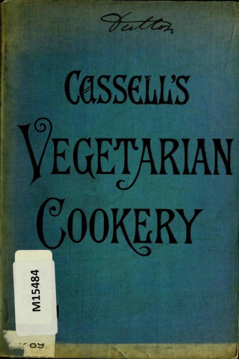 May include: A teal blue book with the title "Cassell's Vegetarian Cookery" in black lettering. The book has a white label with the number "M15484" on the front cover.