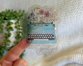 Pegatina holográfica de afirmación positiva: Máquina de escribir con flores