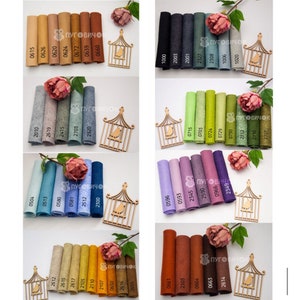 May include: Assortment of felt fabric swatches in various colors, including beige, brown, gray, blue, green, purple, and red. The swatches are arranged in rows and columns, with each swatch labeled with a number. The text "ПУГОВИЧОК" appears in the image.