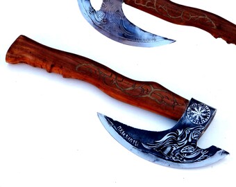 Hacha vikinga hecha a mano: hacha de camping de acero con alto contenido de carbono y mango de madera de fresno.